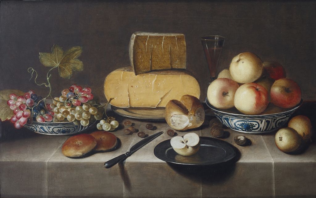 Roelof Koets (Haarlem 1592/93-1654/55) Cheese on a silver plate, red and white grapes and apples in porcelain Wanli bowls, bread rolls, a knife and a sliced apple on a plate, all on a draped table signed and dated 'RKoets / A°. 1626' (RK linked, centre right) oil on panel 52.4 x 83. Estimate: €60,000 - 80,000